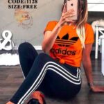 ست تیشرت شلوار آستین کوتاه ورزشی زنانه آدیداس - orange